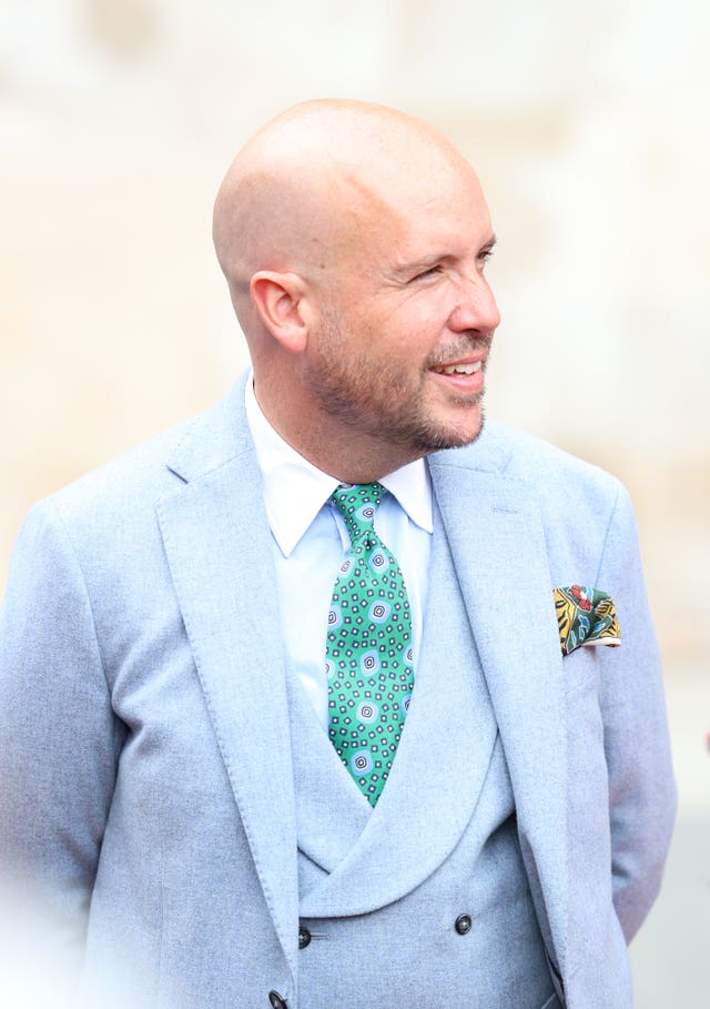 Tom Allen leaves following the wedding of Spice Girl Melanie Brown, Mel B, to fiance hairdresser Rory McPhee at St Paul’s Cathedral, London