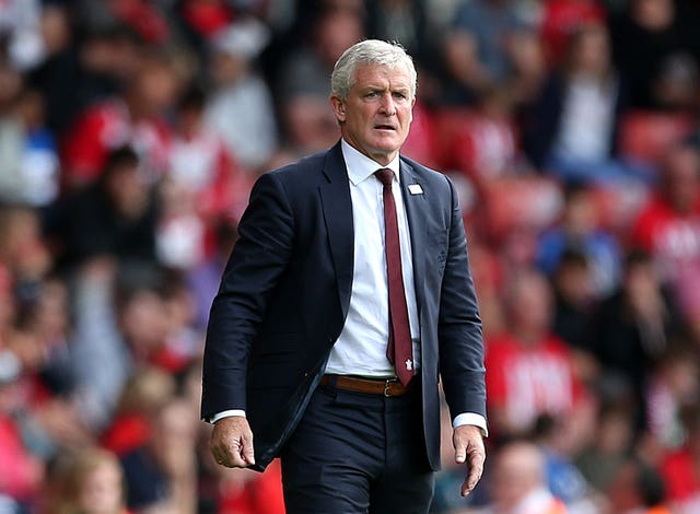 Mark Hughes watches on as his Saints side fall to a defeat 