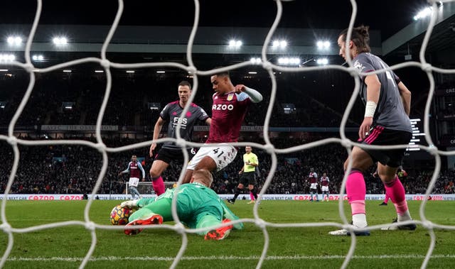 Jacob Ramsey, centre, kicks the ball out of Kasper Schmeichel''s grasp for a disallowed goal