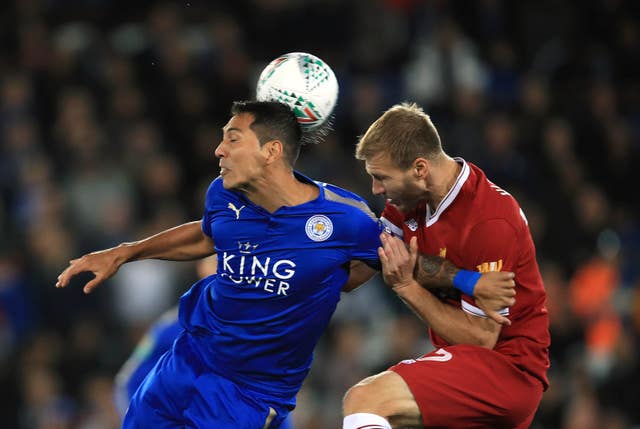 Ragnar Klavan is beaten in the air