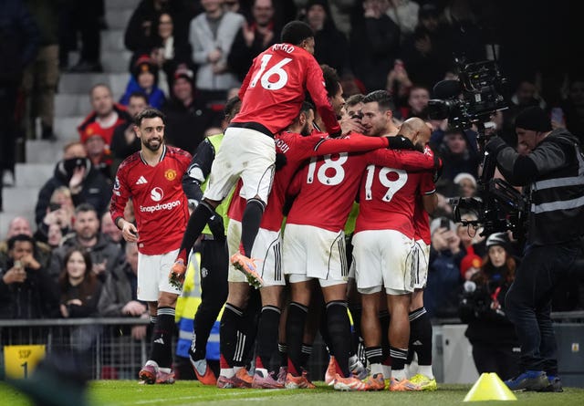 Diogo Dalot (second right) celebrates the opener