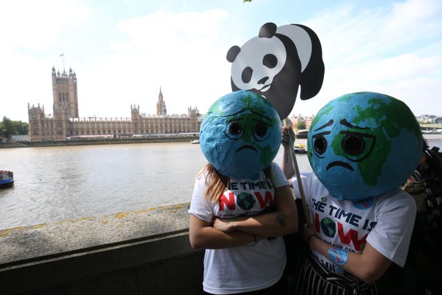 Campaigners were urging MPs to take action on climate and the environment (Jonathan Brady/PA)