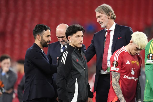 Manchester United head coach Ruben Amorim shakes hands with minority owner Sir Jim Ratcliffe