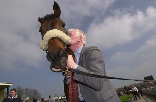 Trainer Jimmy Mangan gives his Grand National winner Monty’s Pass a kiss