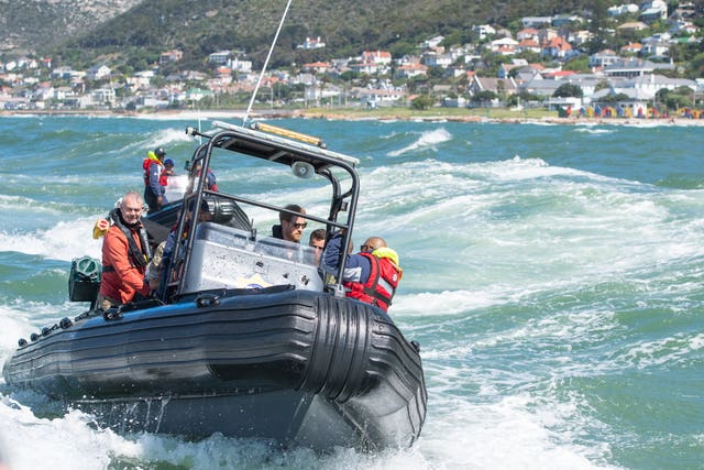 The Duke of Sussex travels on a South African Maritime Police Unit RIB during a visit to Kalk Bay Harbour, in Cape Town on day two of the Royal couple’s visit to South Africa