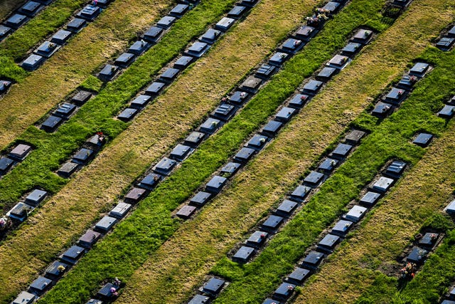 Rows of graves in a cemetery (Ben Birchall/PA)