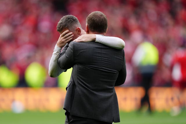 Celtic’s Callum McGregor (left) and manager Brendan Rodgers embrace after the Scottish Gas Men’s Scottish Cup final