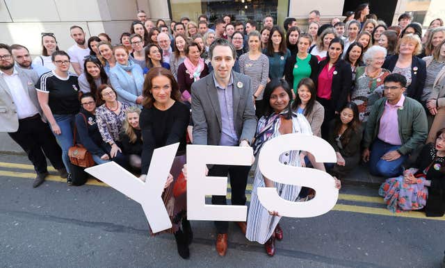 Simon Harris, centre,, at the launch of Doctors for Yes in Dublin