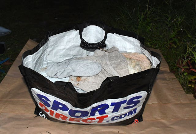 The bloodstained contents of one of two carrier bags recovered from a New Tredegar riverbank