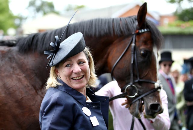 Trainer Eve Johnson Houghton celebrates after winning the Queen Anne Stakes with Accidental Agent