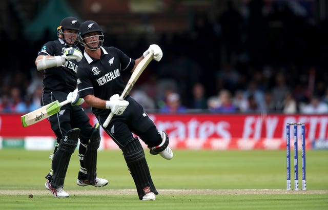 New Zealand’s Colin de Grandhomme runs into batting partner Tom Latham