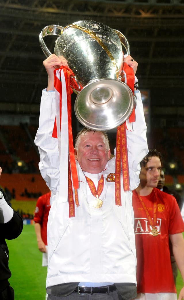 Sir Alex Ferguson lifts the Champions League trophy in Moscow