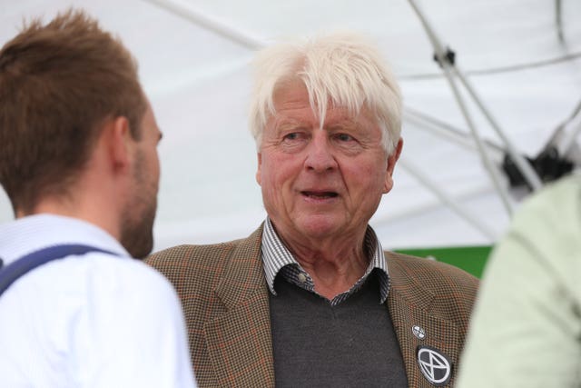 Stanley Johnson - father of Prime Minister Boris Johnson - wearing an Extinction Rebellion badge, joined protesters in Trafalgar Square