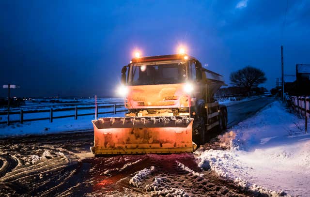 A gritter in snowy conditions near Snowden Hill in Sheffield, South Yorkshire (Danny Lawson/PA)