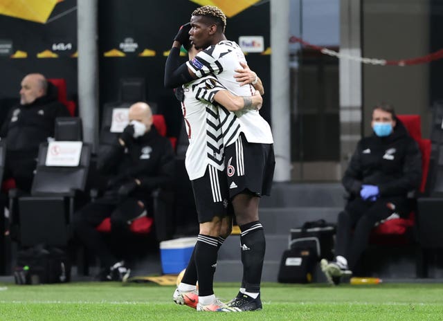 Paul Pogba celebrates his matchwinner in Milan