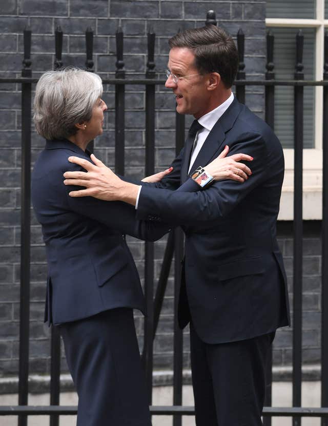 Prime Minister Theresa May greets the Dutch Prime Minister Mark Rutte outside 10 Downing Street in London