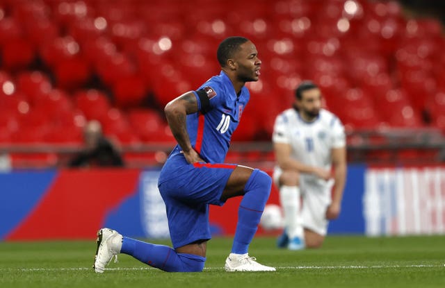 Raheem Sterling takes the knee 