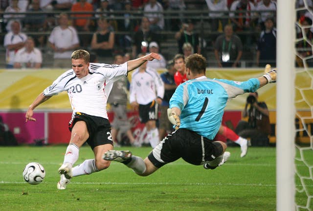 Podolski in action for Germany against Poland at the 2006 World Cup