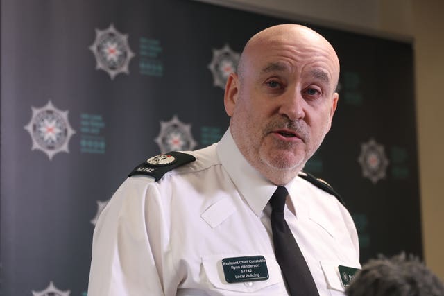 Assistant Chief Constable Ryan Henderson speaking to the media