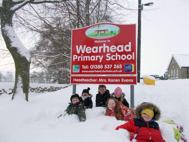 Children from Wearhead Primary School, in County Durham which remained open despite blizzards thanks to teachers battling through the elements and a parent with a digger (Durham County Council/PA)