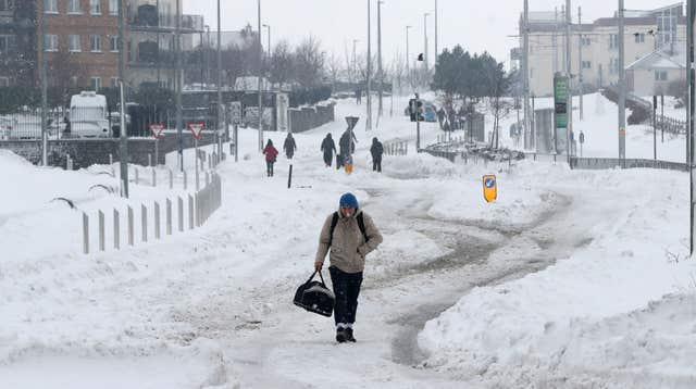 A man walks through City West in Dublin (Niall Carson/PA)