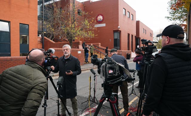 Members of the media outside Leicester Crown Court