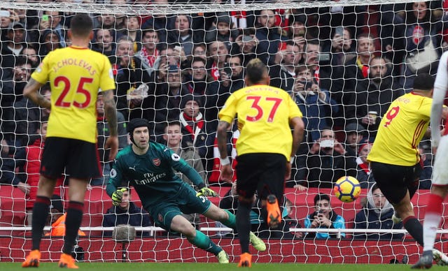 Arsenal goalkeeper Petr Cech saves Troy Deeney''s penalty