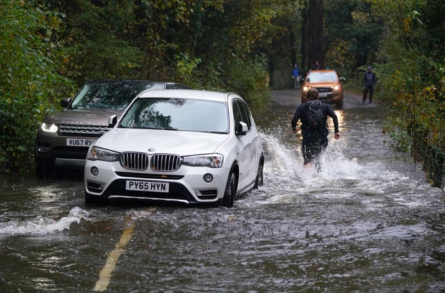 A broken down car in floodwater near Derwentwater, Keswick in Cumbria 