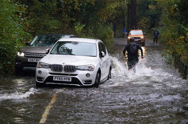 A broken down car in floodwater near Derwentwater, Keswick in Cumbria