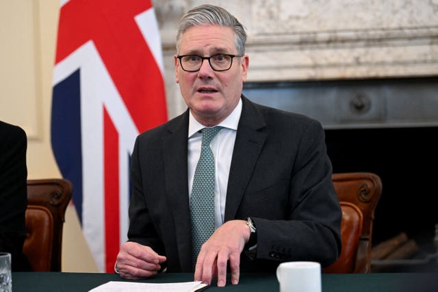 Sir Keir Starmer speaking while seated in 10 Downing Street in front of a Union flag