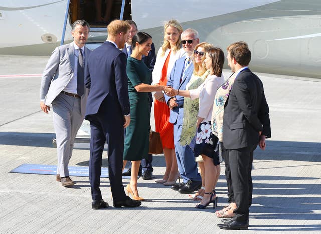 Harry, Meghan and various dignitaries