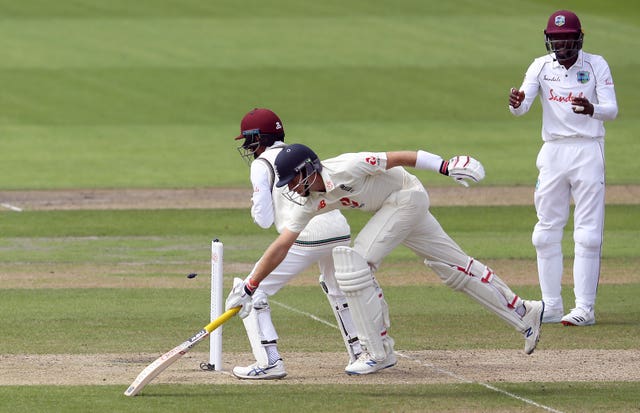Root's run out put England under pressure