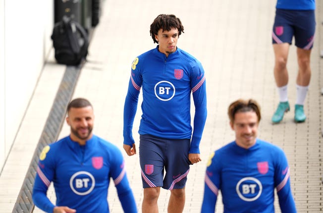 Trent Alexander-Arnold, back and Jack Grealish, right