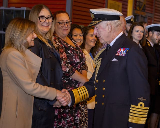 The King meets members of the Royal Navy and their families