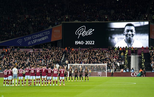 West Ham and Brentford players applaud in memory of Brazil great Pele. The former striker died on December 29 at the age of 82. He is the only man to win the World Cup three times - lifting the trophy in 1958, 1962 and 1970 - and was named FIFA's Player of the Century in 2000. While tributes were paid across the world, three days of national mourning were declared in his homeland. Pele's Twitter account posted: "Inspiration and love marked the journey of King Pele, who peacefully passed away today. Love, love and love, forever." He is credited with scoring a world-record 1,281 goals in 1,363 appearances during a 21-year career, including 77 goals in 92 matches for his country