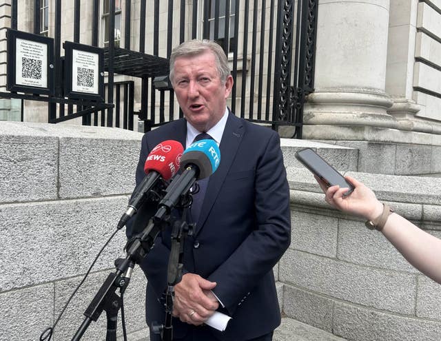 Minister Sean Canney speaking to the media outside Government Buildings in Dublin