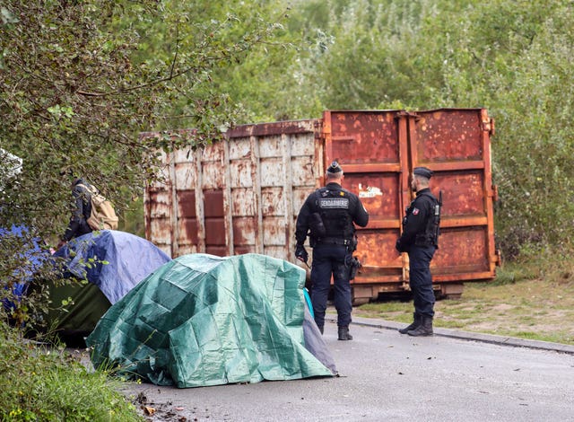 French police clear a migrant camp