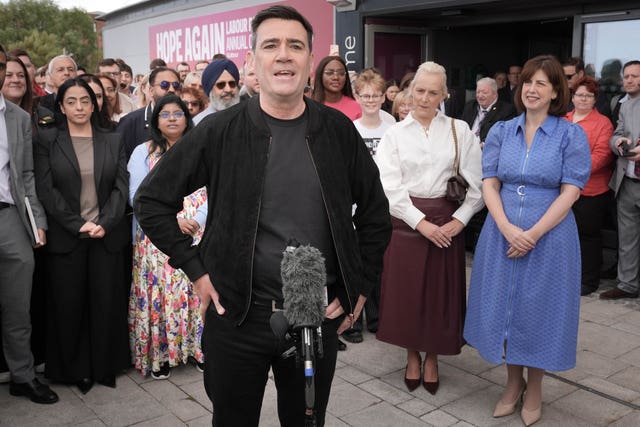 Andy Burnham speaking to the media