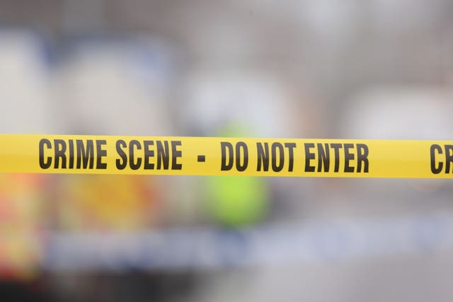 Crime scene tape (Peter Byrne/PA)