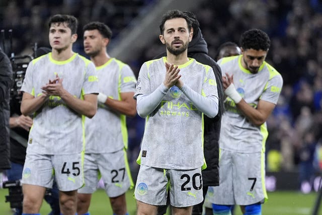 Manchester City's Bernardo Silva applauds supporters