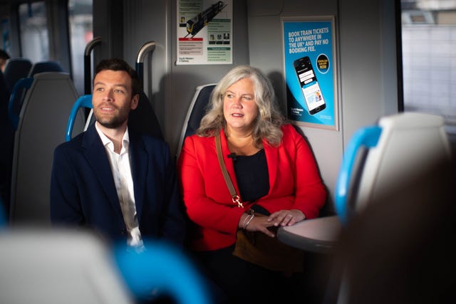 Heidi Alexander sitting on a train