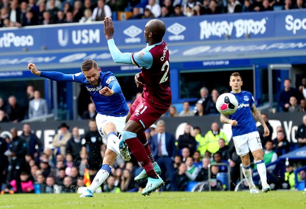Gylfi Sigurdsson (left) scores a superb second