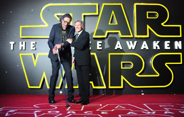 Peter Mayhew and Harrison Ford