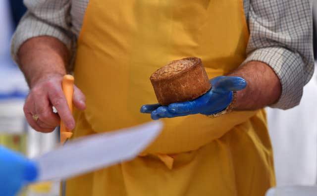 Crust and colour are part of the judging criteria (Joe Giddens/PA)