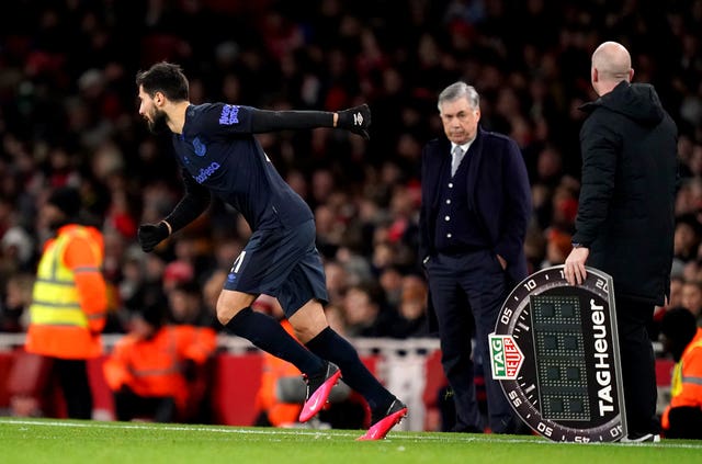 Andre Gomes, left, comes on for his return from injury