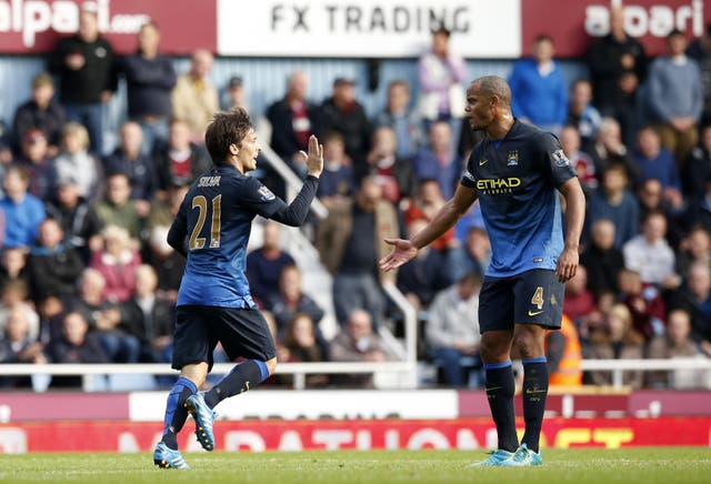 Long-serving Manchester City midfielder David Silva, left, has taken on the captaincy following Vincent Kompany's departure