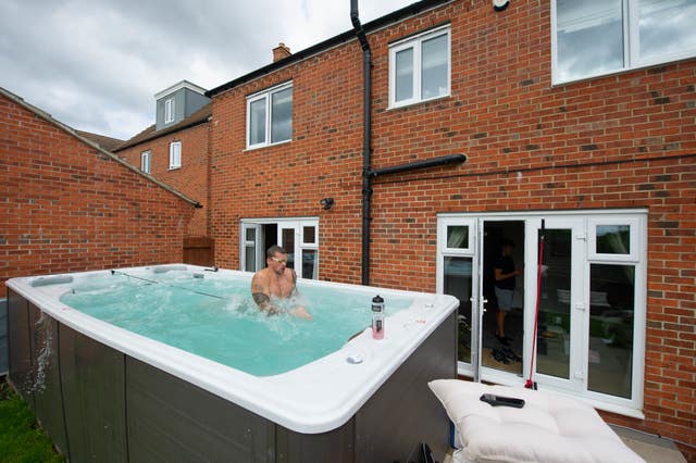 Adam Peaty trains at his house in Loughborough