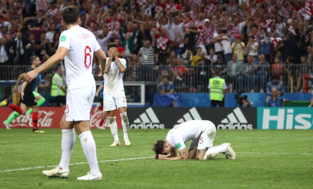 England’s John Stones reacts after Croatia’s Mario Mandzukic scores his side’s second goal of the game