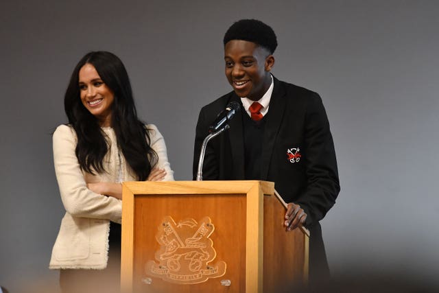 Meghan visits a school