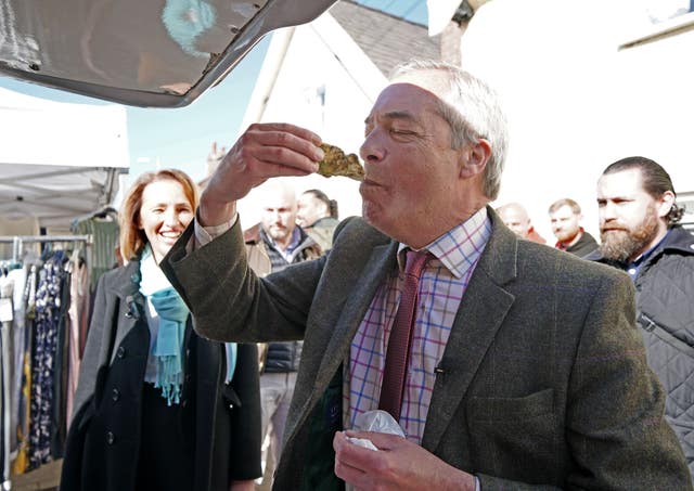 Nigel Farage eating an oyster